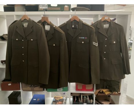 Four post war British army no. 2 service dress jackets and trousers, one with insignia 