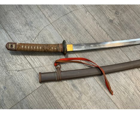 A WWII Japanese Type 98 Japanese Officer's Shin-Gunto sword, polished single-edged blade of typical form. The tang with  char