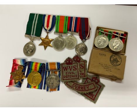 A quantity of medals and ephemera from the Critchley and Sutherland families. A WWII and later group of five consisting of El