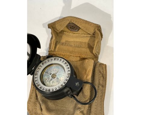 A WWII 1941 dated compass case with later compass 