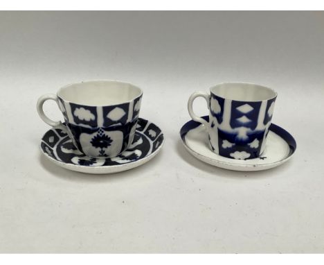 Two WWII German Kriegsmarine U-Boat blue and white porcelain cups and saucers, one set marked with eagle and swastika over M 