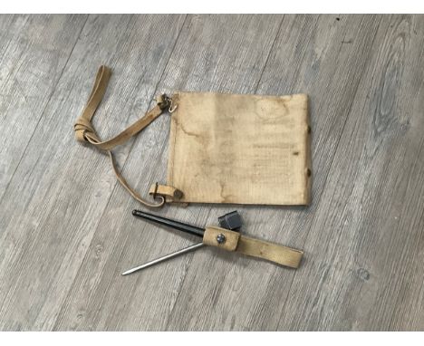 A WWII British Lee Enfield plug bayonet with scabbard and canvas webbing frog, together with a 1944 dated canvas map board (2