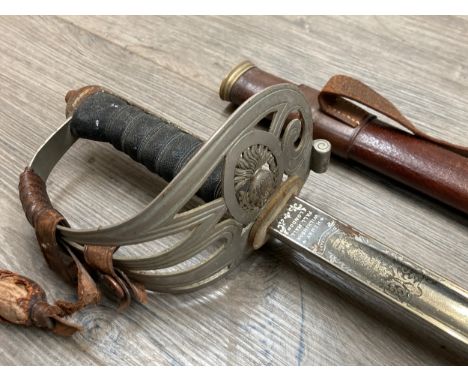 A WWI era 1854 pattern officer’s sword  with HAC emblem to guard and engraved blade by Henry Wilkinson, London, numbered 5666