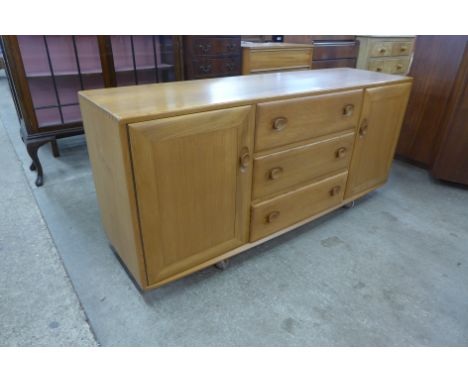 An Ercol Blonde elm Windsor sideboard 