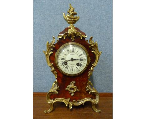 An early 20th Century French faux tortoiseshell and gilt metal mounted mantel clock 
