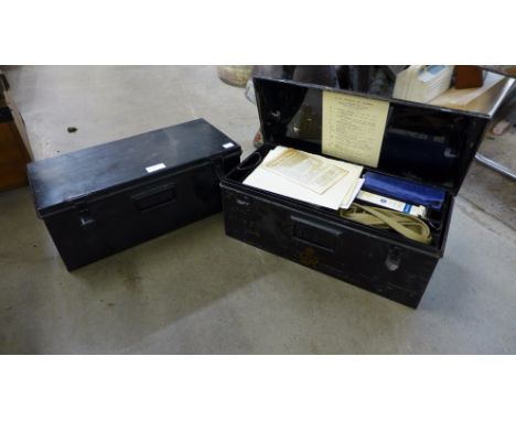 Two small steel boxes, one containing first aid equipment 