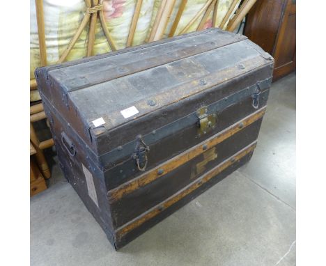 An early 20th Century dome topped steamer trunk 