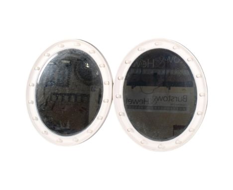 A pair of Vintage oval bevelled-edge mirrors in painted frames, H60cm