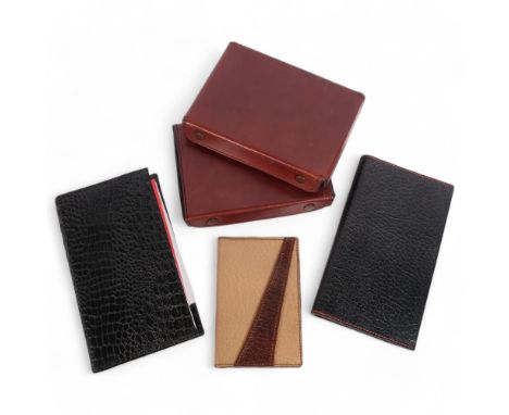 2 leather-cased travelling playing card cases, 2 leather address book covers, and another (5), all from the workshop of saddl