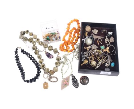 A group of various jewellery, including a Baltic amber necklace, a 19th century tortoiseshell and gold pique brooch, a micro-