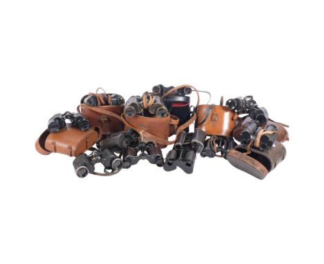 A group of Antique and Vintage prismatic binoculars, including Karl Schmidt World War I binoculars, various Goerz Trieder Wor
