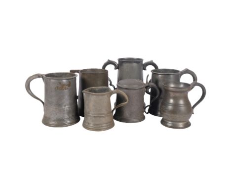 A 2-handled Vintage pewter mug with glass bottom, 18cm, Victorian and other pewter mugs, including a lidded pint tankard