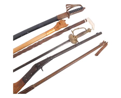 A Vintage mid-century child's cap gun, unmarked, an Officer's sword with brass handle, a Vintage wooden walking cane with hor