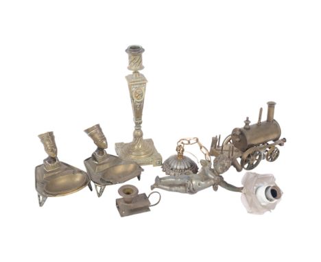 Egyptian figure brass ashtrays, a brass locomotive, candlestick, etc