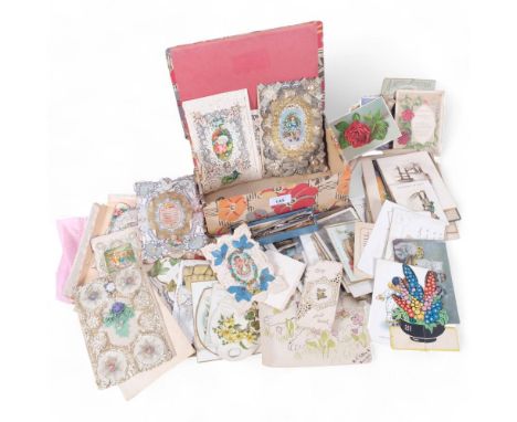 A box containing various Vintage postcards, including Mabel Lucy Atwell, humorous greeting cards, propelling pencils, etc