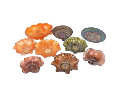 A group of Vintage Carnival glass bowls, including 2 purple lustre comports with moulded grapevine design, largest 23cm (9)