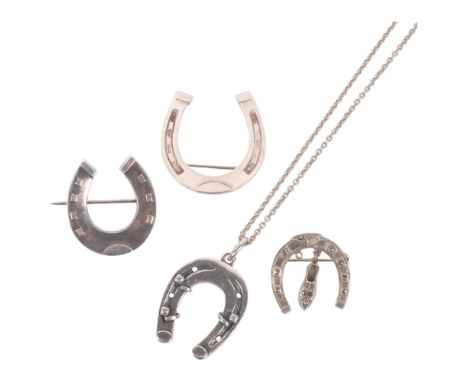 A Danish sterling silver horseshoe design pendant necklace, and 3 silver horseshoe design brooches