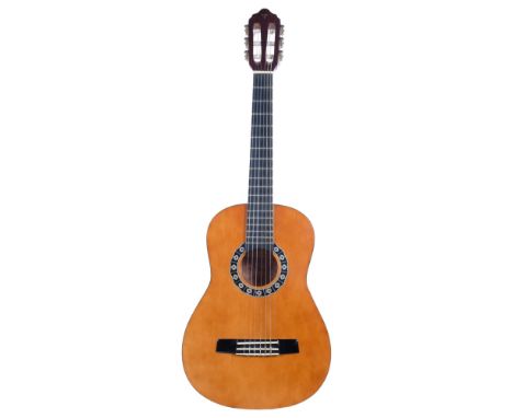 A Valencia half-size Classical guitar, model no. CG1K 1/2/NA, serial no. 8201499, labelled to inside