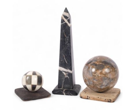 A two-colour marble obelisk, H21cm, a specimen marble ball, and another (3)