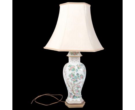 A Chinese porcelain table lamp with painted floral decoration, with shade, H68cm