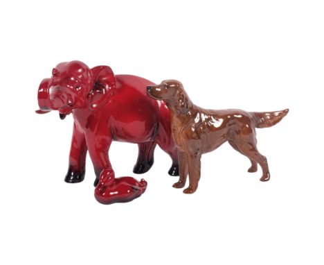A Royal Doulton Flambe ceramic elephant, stamp to foot, H16cm, a Royal Doulton Flambe duck, and a Beswick dog (3)