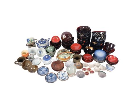 A large quantity of Japanese lacquer and ceramic tea bowls, dishes, teapot, etc