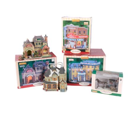Lemax lamps modelled as illuminated buildings, and a model horse and cab