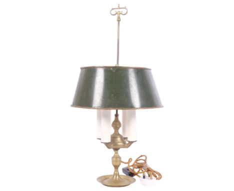 A brass 4-branch table lamp with adjustable Tole Ware  shade