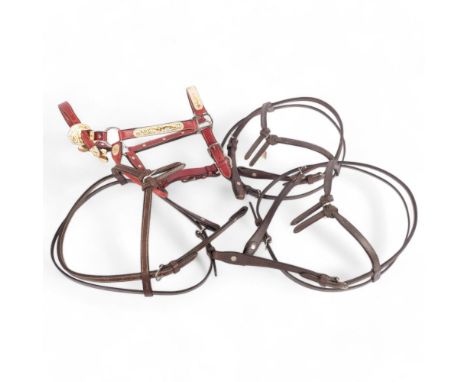 A bespoke made red leather and metal-mounted horse's bridle, and 3 others, all from the workshop of saddlemaker Brian R Borre