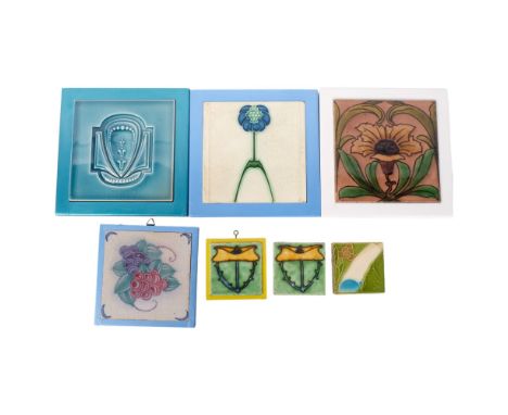A selection of Art Nouveau style ceramic tiles, various floral decorations, each in modern wooden-cased hanging frames, large