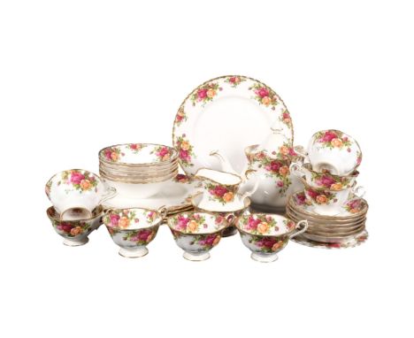 A Vintage Royal Albert part tea set, including teapot, and matching dinner plates and cereal bowls