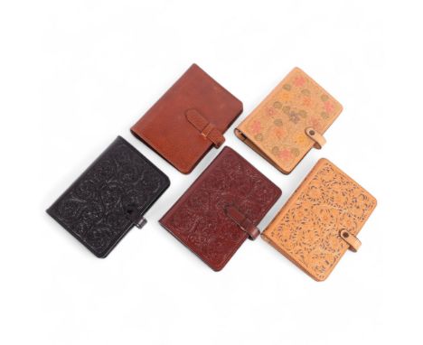 A group of 5 bespoke-made embossed leather Filofax binders, all from the workshop of saddlemaker Brian R Borrer (Artistry in 