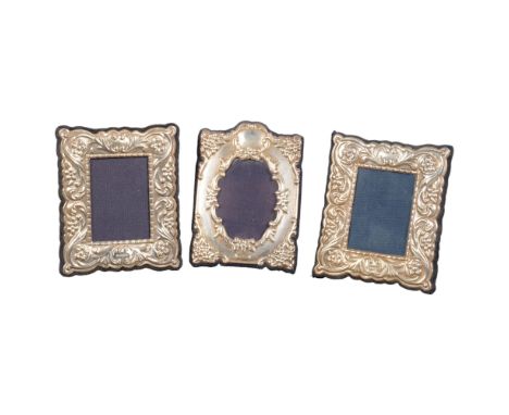3 small modern embossed silver-fronted photo frames