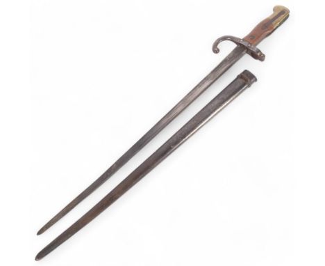 A 1866 pattern French Chassepot bayonet and scabbard, pattern on. 95225 to the guard and matching number to the scabbard, bay