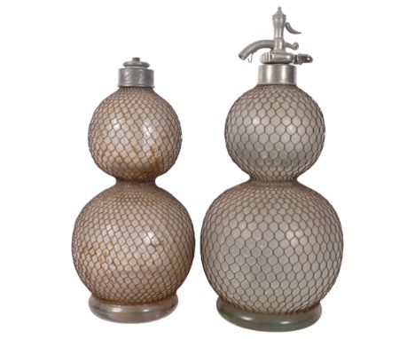 An unusual Vintage glass soda syphon, clad in wire mesh with chrome mount, H49cm, and matching smaller syphon, lacking top
