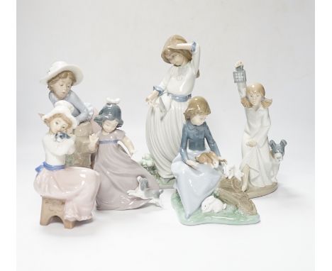 Six Nao figure groups of children playing with animals, (two boxed), largest 25cm high