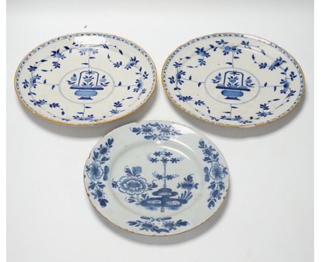 A pair of late 18th century Delft plates and an English delftware plate (3)