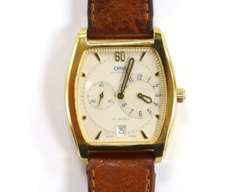 A gentleman's steel and gold plated Oris Automatic wrist watch with tonneau case and two subsidiary dials, on a leather strap