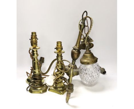Three brass desk lamps and a three-branch electrolier together with a brass-mounted ceiling light with clear glass shade larg
