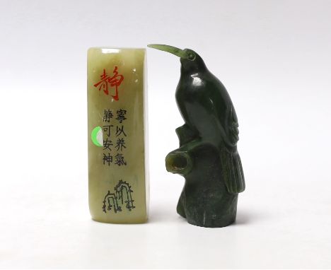 * * A carved spinach green jade model of a bird and a Chinese soapstone scroll weight, largest 7cm high