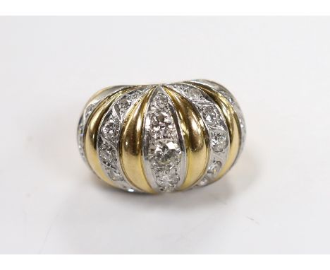 A yellow metal and diamond set five row line cluster set dress ring, size O, gross weight 17.7 grams.