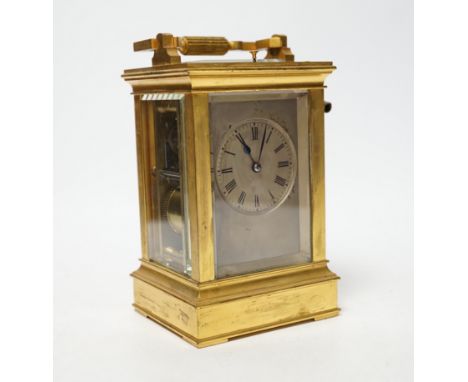 ** ** A late 19th century French gilt brass cased eight day repeating carriage clock with key, 17cm Please note this lot attr