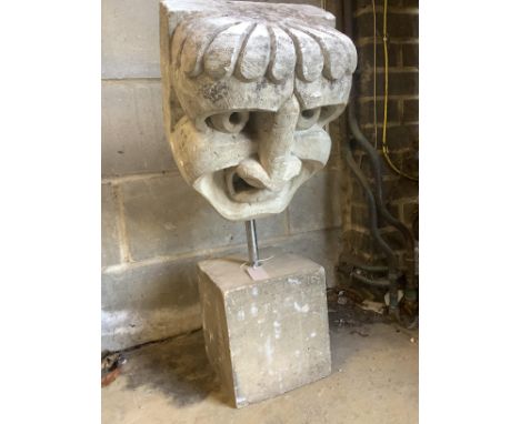 A stone carving on square plinth, 'The stare', height 76cm