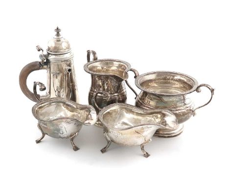 A mixed lot of silver items,comprising: a small Edwardian silver coffee pot, by Heming and Co. London 1907, in the George I m