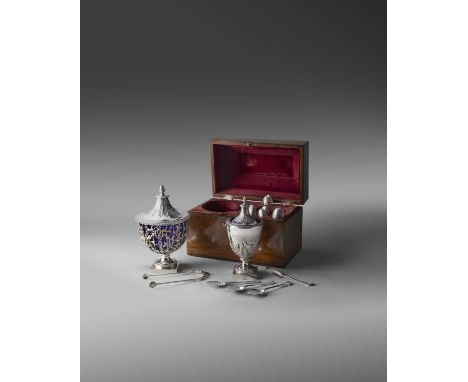 A George III silver tea caddy, sugar basket and cover, set of twelve teaspoons and a pair of sugar nips, by Daniel Smith and 