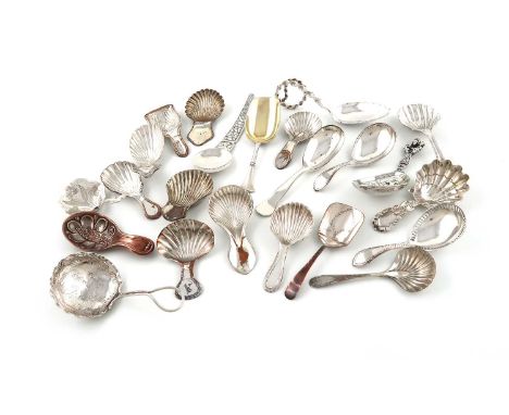 A collection of caddy spoons,comprising foreign silver ones: a Russian one of shovel form, three Scandinavian ones, a French 