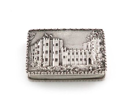 A Victorian silver 'castle-top' vinaigrette, Kenilworth Castle, by Nathaniel Mills, Birmingham 1837, rectangular form, the hi