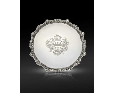 A large George II silver salver, by Edward Wakelin, London 1750,circular form, the pierced border with masks, shells and trai