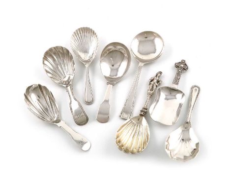 A collection of eight silver caddy spoons,comprising: a Scottish provincial one, inscribed Iona and retailed in Oban, with a 