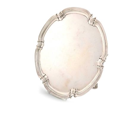 A silver salver,by the Cooper Brothers, Sheffield 1966,shaped circular form, moulded border, on three bracket feet, diameter 
